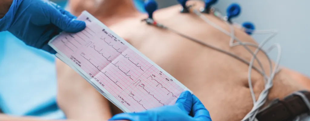 Patient in bed with test results